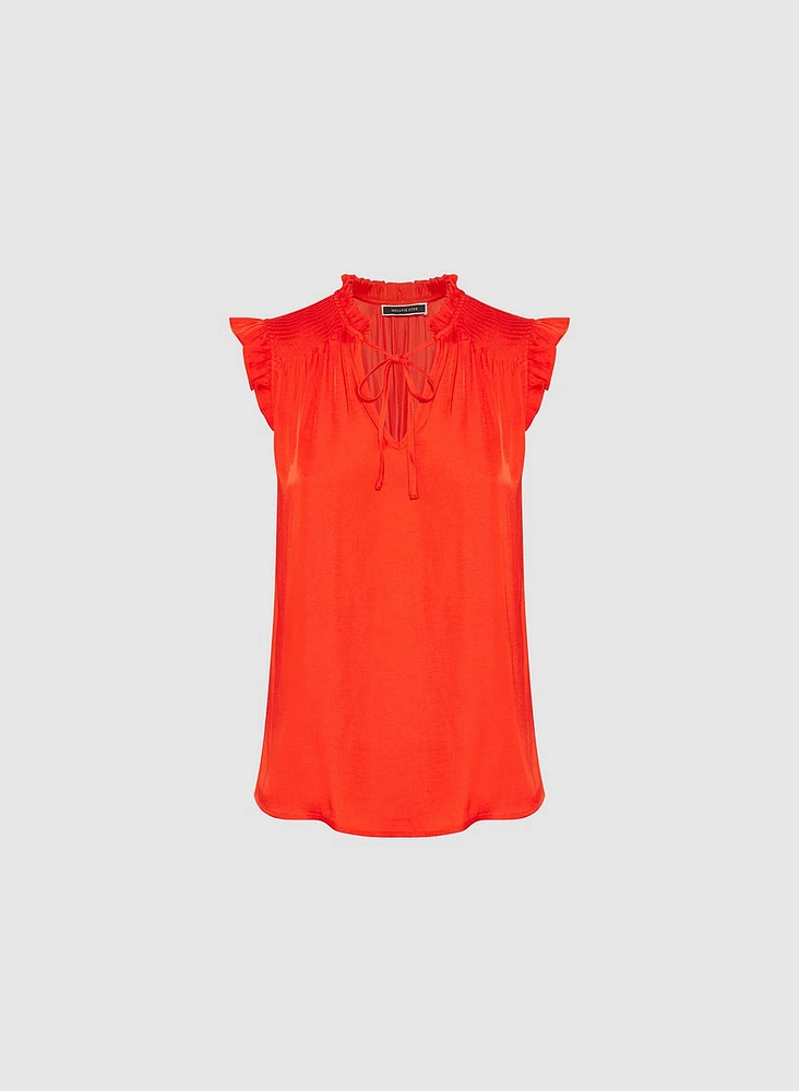 Blouse à mancherons volantés