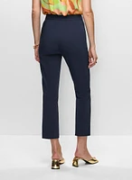 Pantalon à jambe étroite avec poches passepoilées