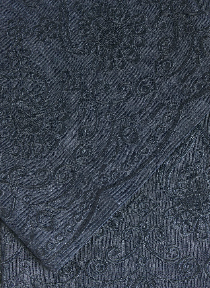 Pantalon large à ourlet brod