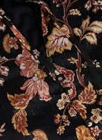 Blouse florale à encolure volantée