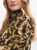 Blouse léopard à manches bouffantes