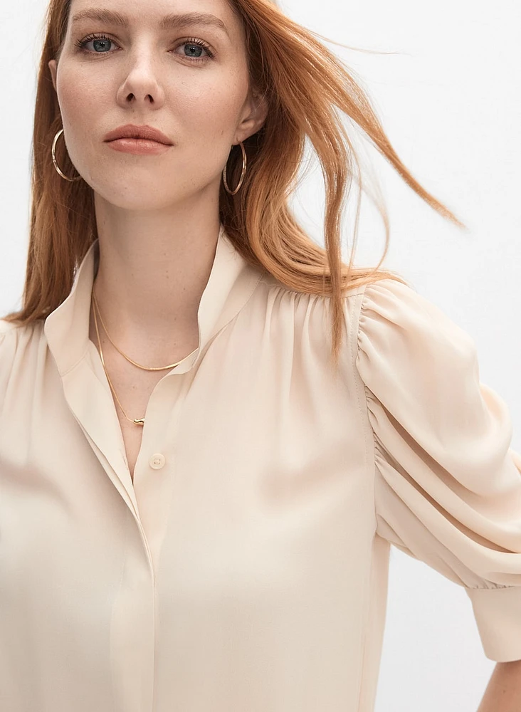 Blouse à manches bouffantes drapées