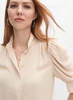 Blouse à manches bouffantes drapées