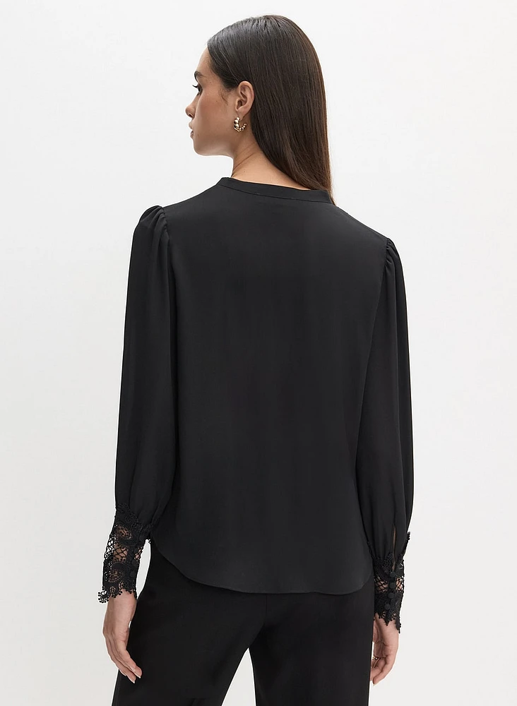 Blouse boutonnée à détails en dentelle