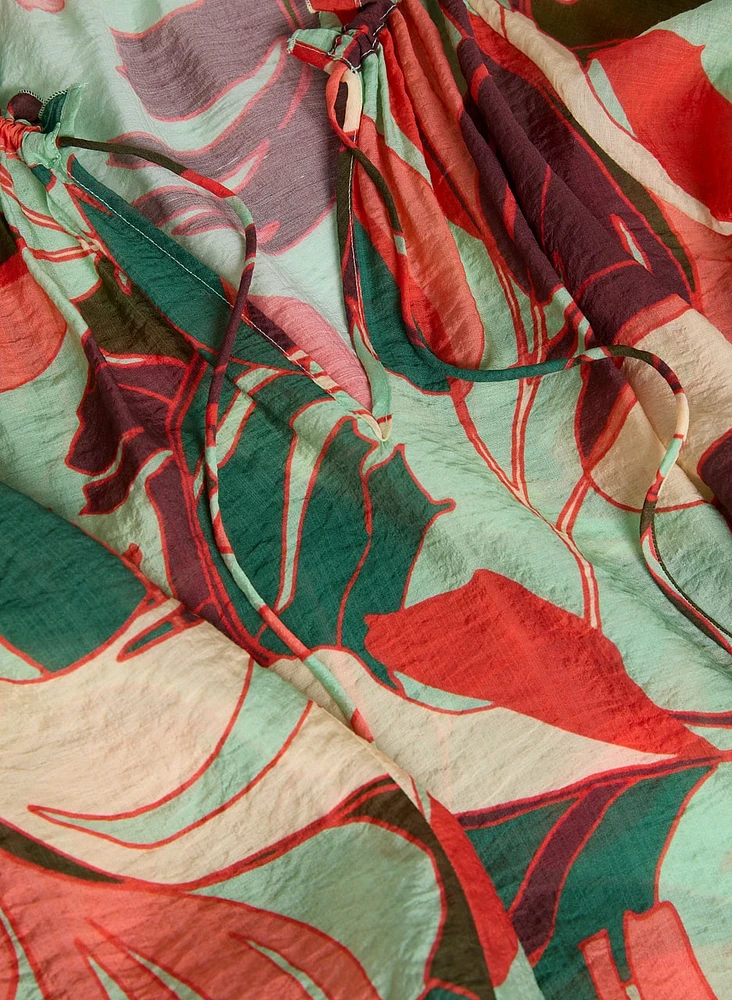 Blouse à manches bouffantes et motif géométrique