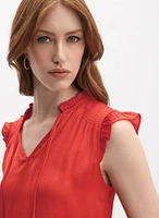 Blouse à mancherons volantés