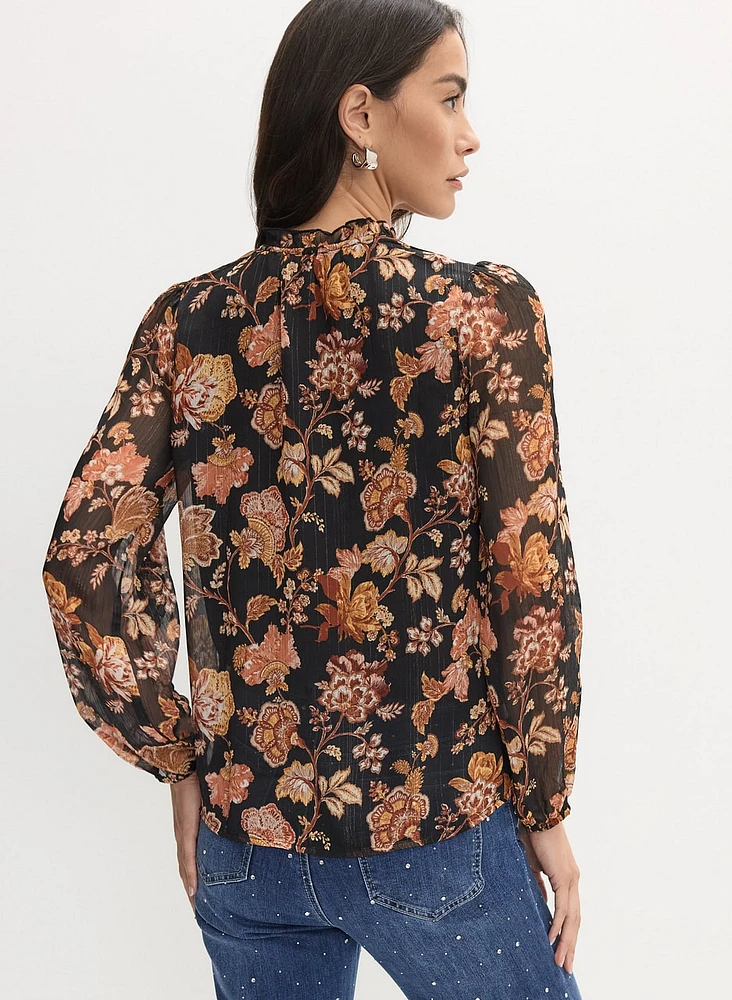 Blouse florale à encolure volantée