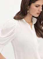 Blouse à col montant