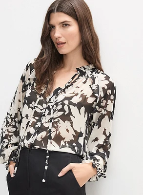 Blouse boutonnée à motif floral