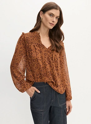 Blouse à manches bouffantes et motif léopard