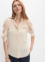 Blouse à manches bouffantes drapées