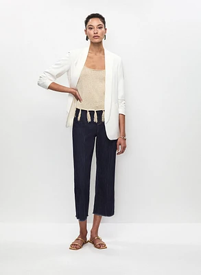 Camisole avec franges et jean à jambe évasée