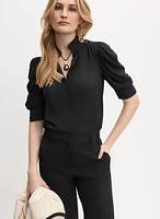 Blouse à col montant