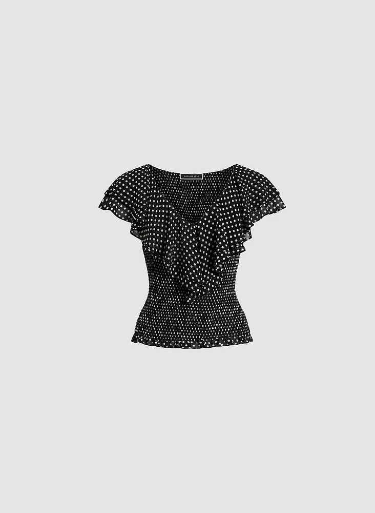 Blouse à pois et volants