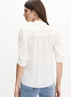 Blouse à col montant