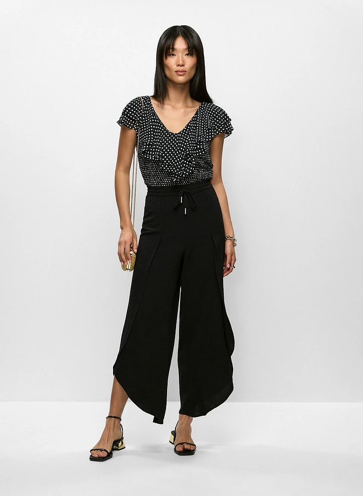 Blouse à pois et pantalon à ourlet tulipe