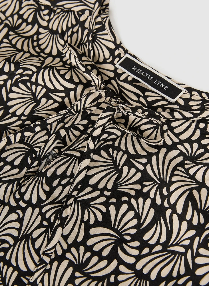 Blouse à manches volantées