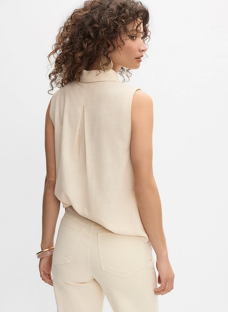 Blouse sans manches à poches en crochet