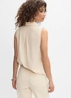 Blouse sans manches à poches en crochet