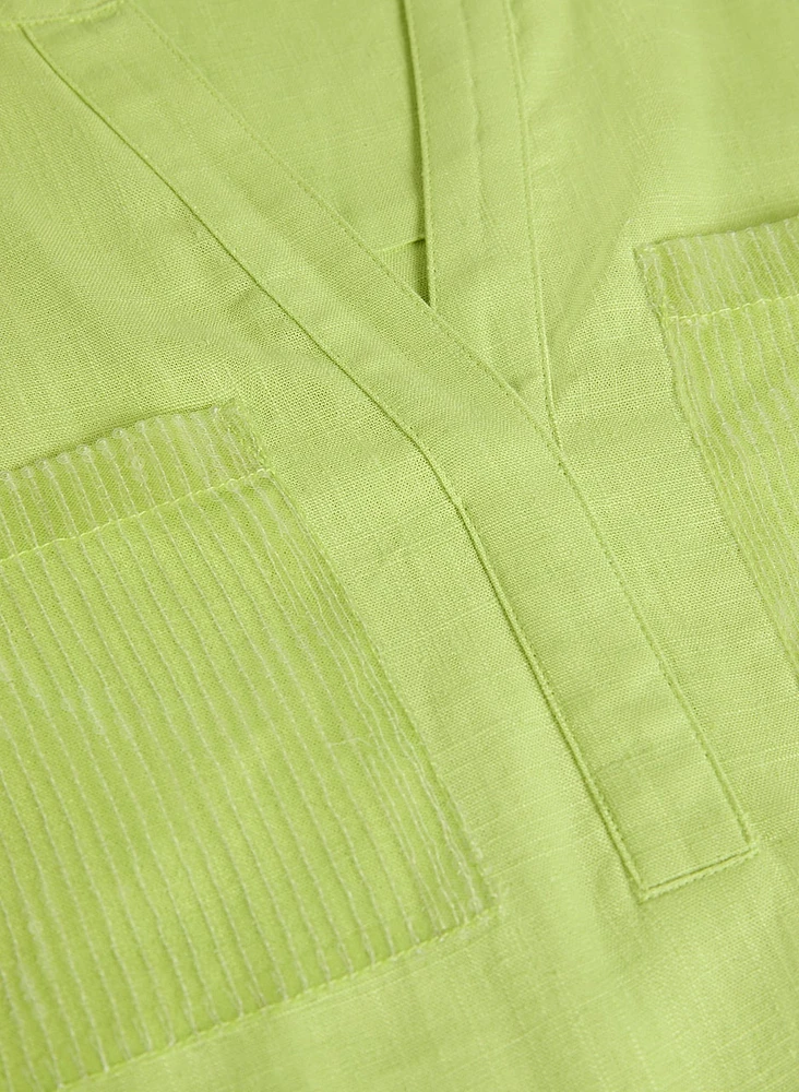 Blouse en lin avec poches à sequins