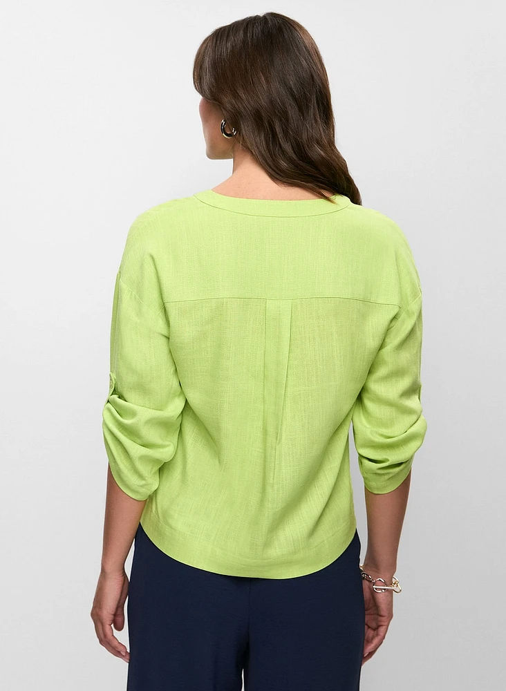 Blouse en lin avec poches à sequins