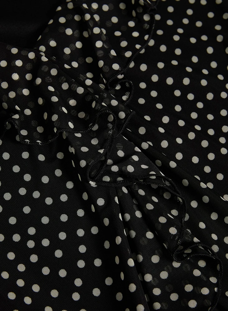 Blouse volantée à pois