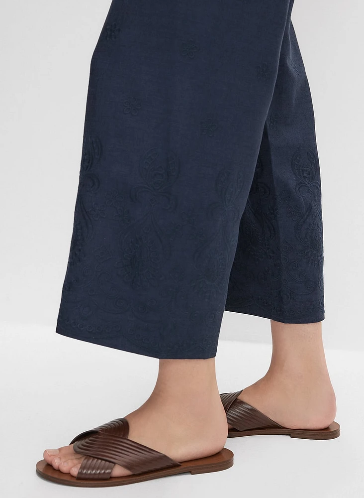 Pantalon large à ourlet brodé