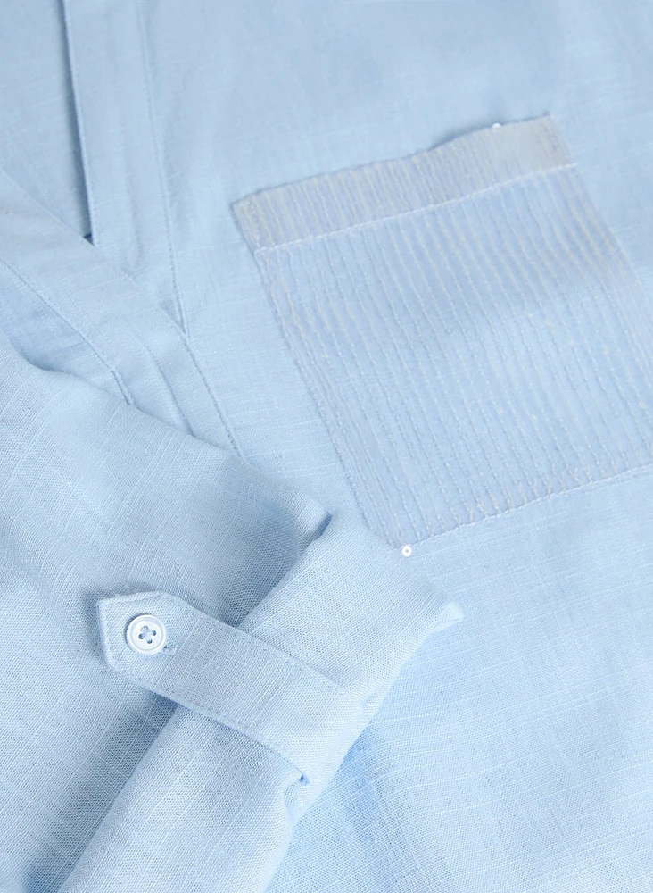 Blouse en lin avec poches à sequins