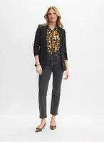 Blouse léopard à manches bouffantes
