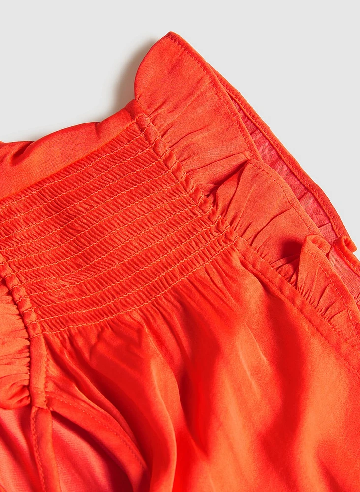 Blouse à mancherons volantés