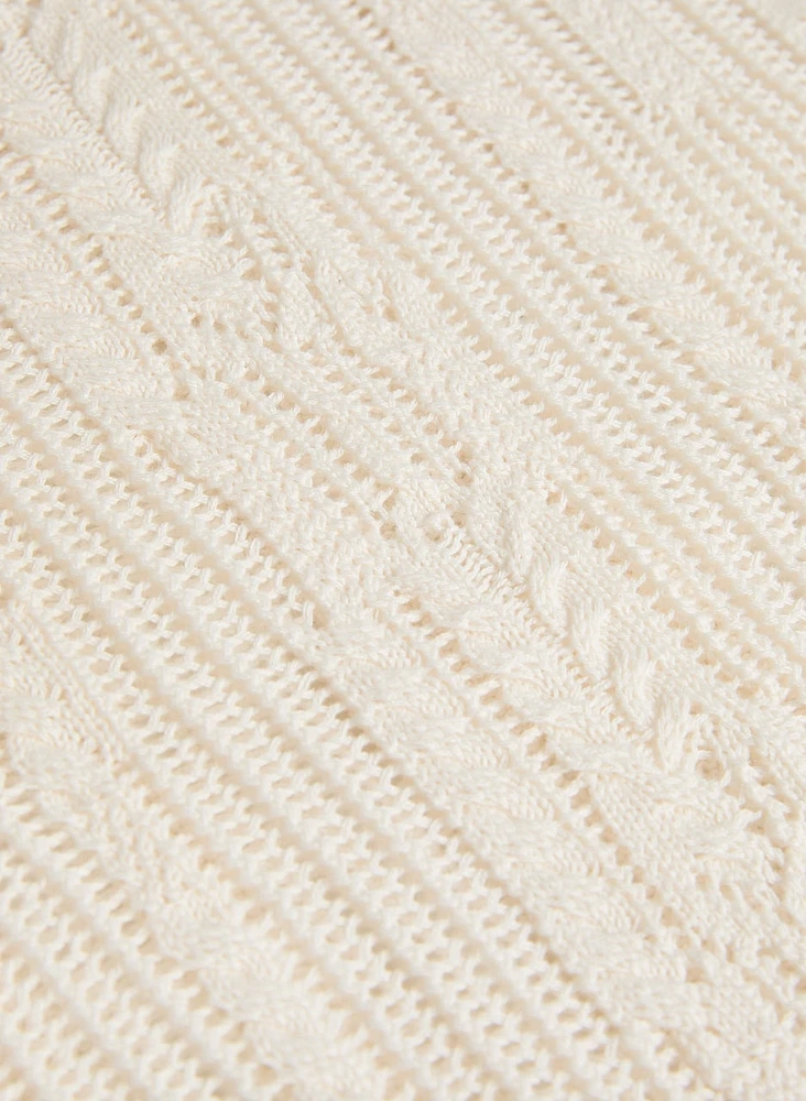 Pull en tricot ajouré