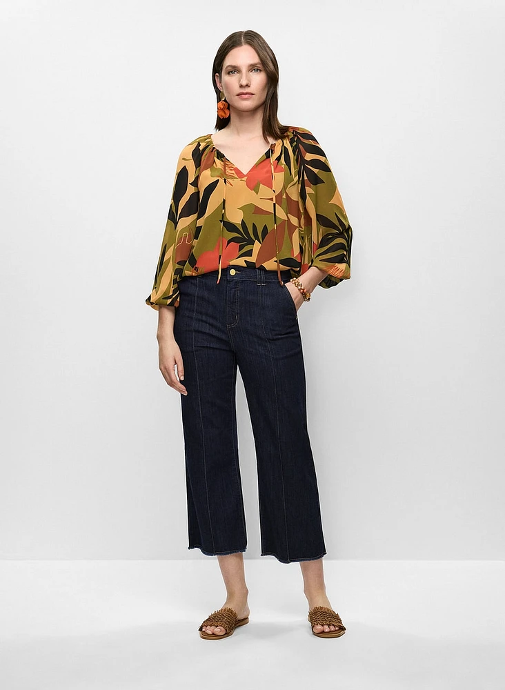 Blouse en chiffon et jean à jambe évasée