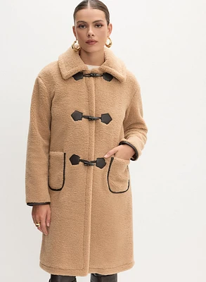 Manteau à effet moutonné poches appliquées