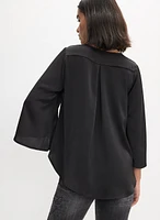 Blouse en satin à manches évasées