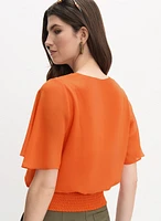 Blouse à manches évasées