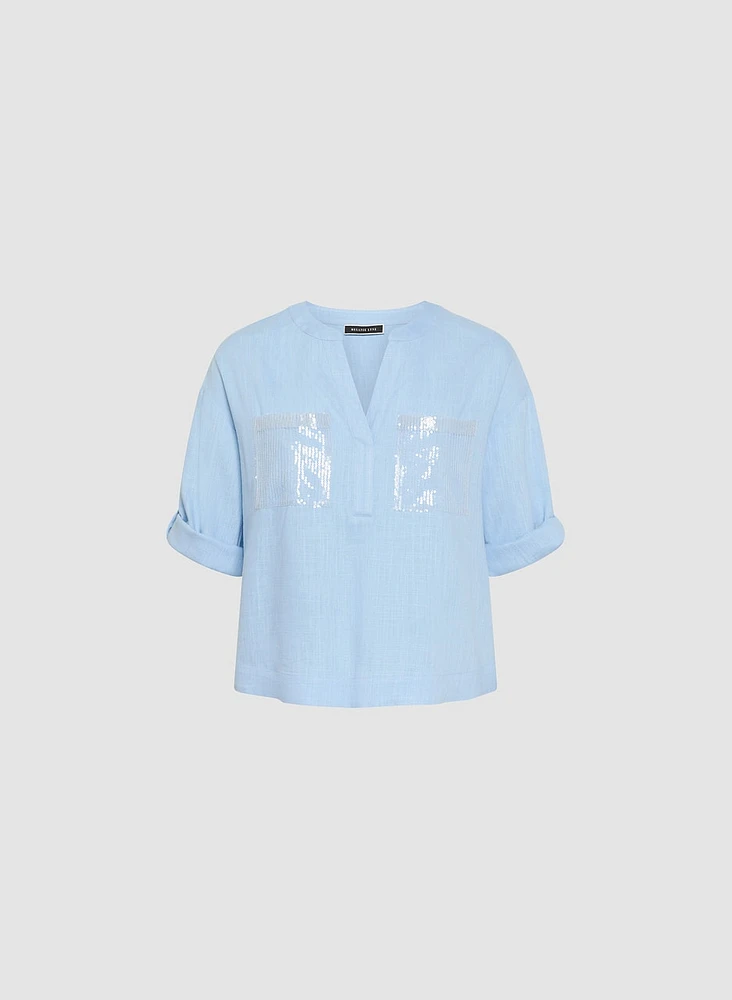 Blouse en lin avec poches à sequins