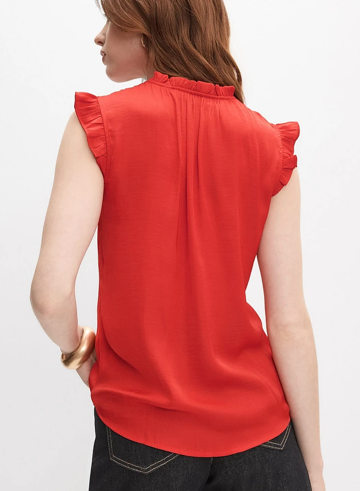 Blouse à mancherons volantés