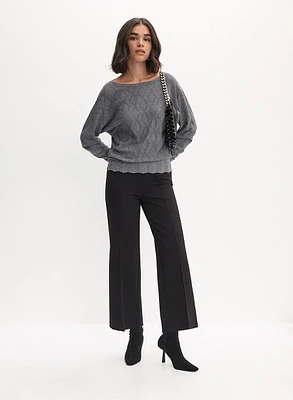 Pull à tricot géométrique et pantalon gaucho