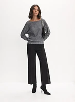 Pull à tricot géométrique et pantalon gaucho