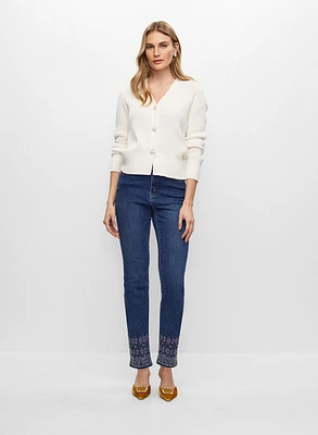 Cardigan à boutons et jean à broderies
