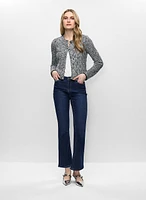 Cardigan en tweed et jean évasé
