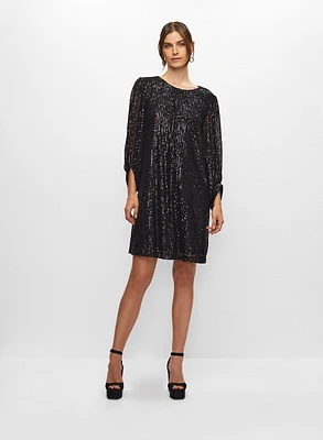 Robe en sequins à manches bouffantes