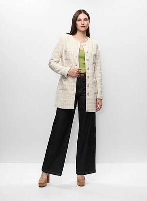 Veste longue en tissu bouclé et jean à jambe large