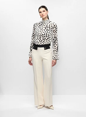 Blouse à pois en chiffon et pantalon évasé