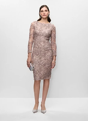 Robe à motifs et pochette à cordes métallisées 