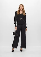 Pull péplum à boucle et pantalon à dentelle