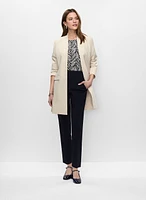 Veste redingote et pantalon jambe étroite