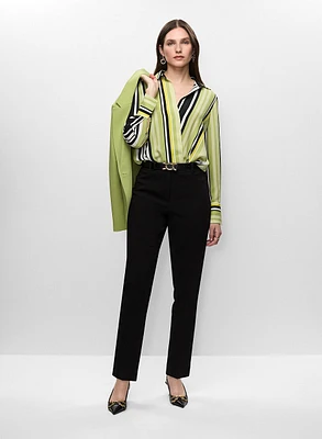 Veste mi-longue et blouse rayée