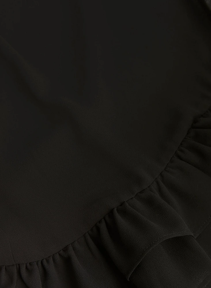 Robe à manches cloche et volants