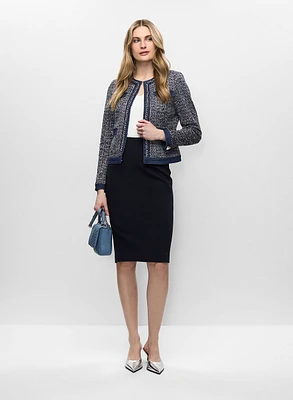 Veste en bouclé et jupe crayon